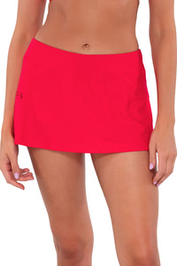 Front pose #1 of Daria wearing Sunsets Geranium Sporty Swim Skirt