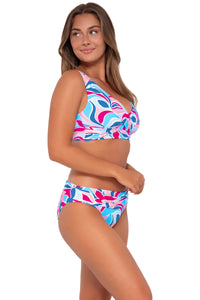 Side pose #1 of Taylor wearing Sunsets Making Waves Elsie Top with matching Unforgettable Bottom swim hipster