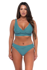 Front pose #1 of Nicky wearing Sunsets Ocean Unforgettable Bottom with matching Elsie Top underwire bikini