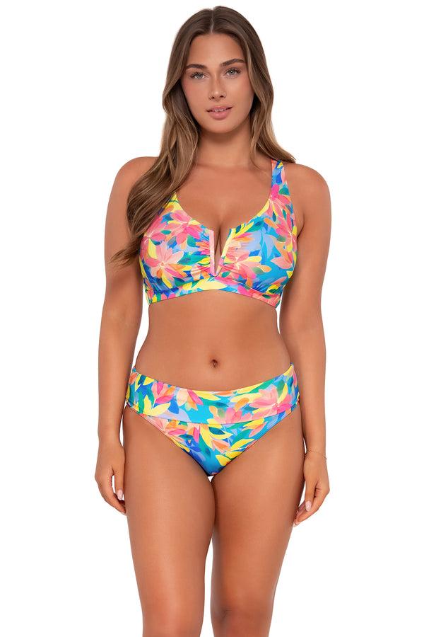 Front pose #1 of Taylor wearing Sunsets Shoreline Petals Hannah High Waist Bottom showing folded waist with matching Vienna V-Wire bikini top