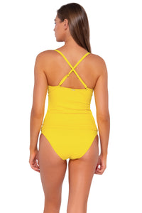 Back pose #1 of Daria wearing Sunsets Lemon Zest Sandbar Rib Simone Tankini Top showing crossback straps with matching Audra Hipster bikini bottom