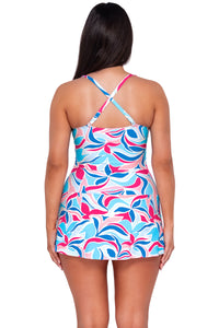 Back pose #1 of Nicki wearing Sunsets Escape Making Waves Sienna Swim Dress One Piece showing crossback straps