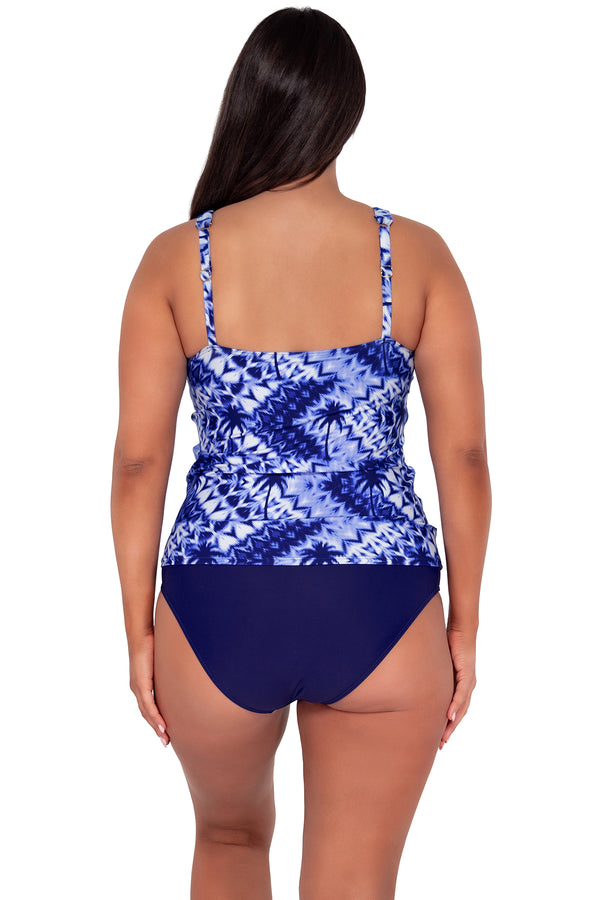 Back pose #1 of Nicki wearing Sunsets Escape Tulum Emerson Tankini Top paired with Indigo Hannah High Waist