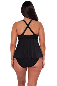 pose #1 of Nicki wearing Sunsets Escape Black Seagrass Texture Marin Tankini Top