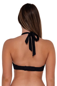Back pose #2 of Taylor wearing Sunsets Black Seagrass Texture Vienna V-Wire Top as a halter bikini