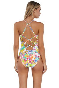 Back pose #1 of Jessica wearing Sunsets Botanical Bliss Sandbar Rib Veronica One Piece showing crossback straps