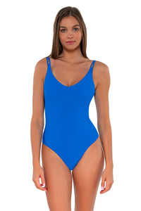 Front pose #2 of Daria wearing Sunsets Electric Blue Veronica One Piece