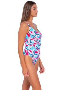 Side pose #1 of Daria wearing Sunsets Making Waves Veronica One Piece