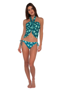 Front pose #1 of Gigi wearing Sunsets Palm Beach Philomena Pareo as a halter cover-up paired with Everlee Tie Side bikini bottom