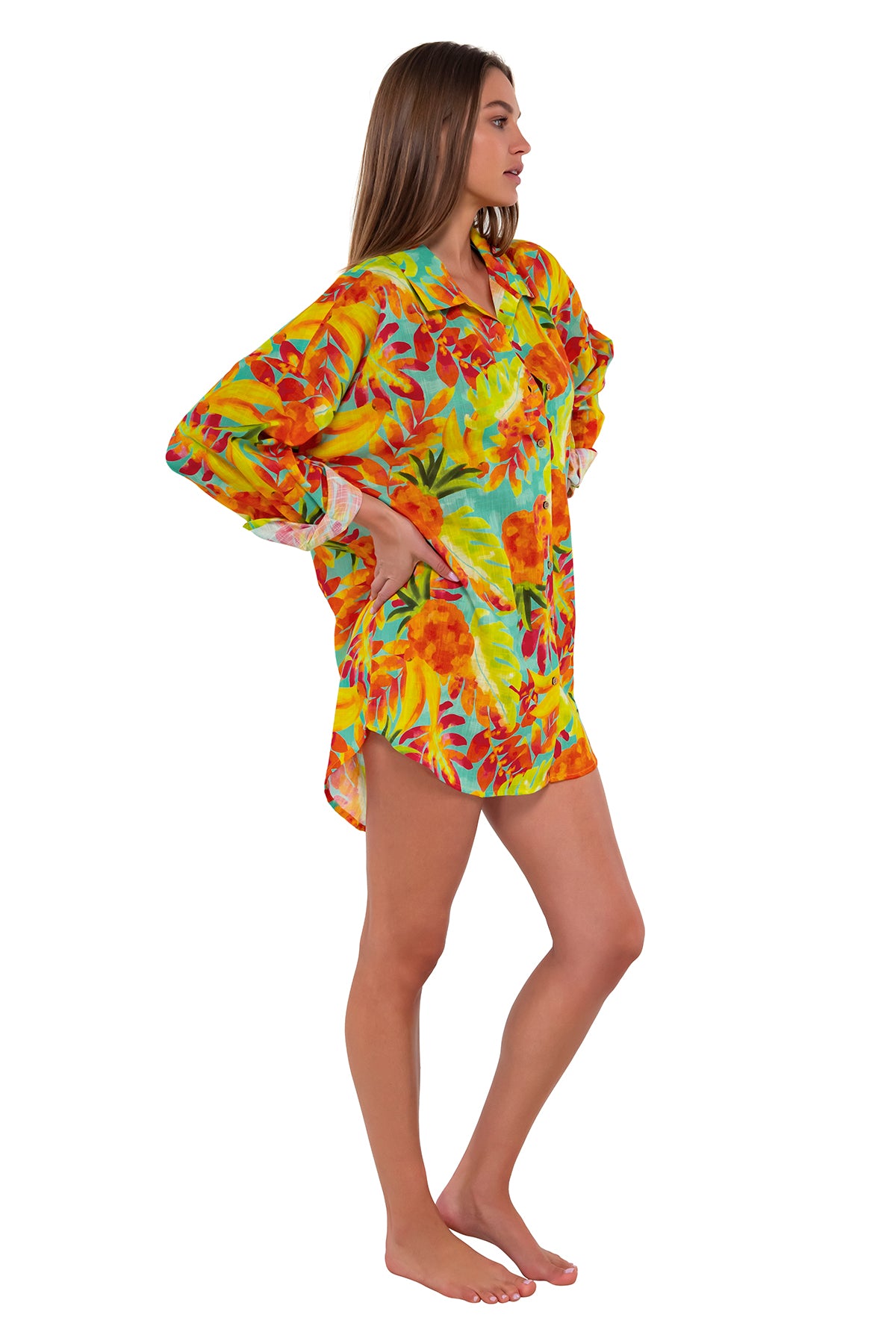 Side pose #1 of Daria wearing Sunsets Lush Luau Delilah Shirt