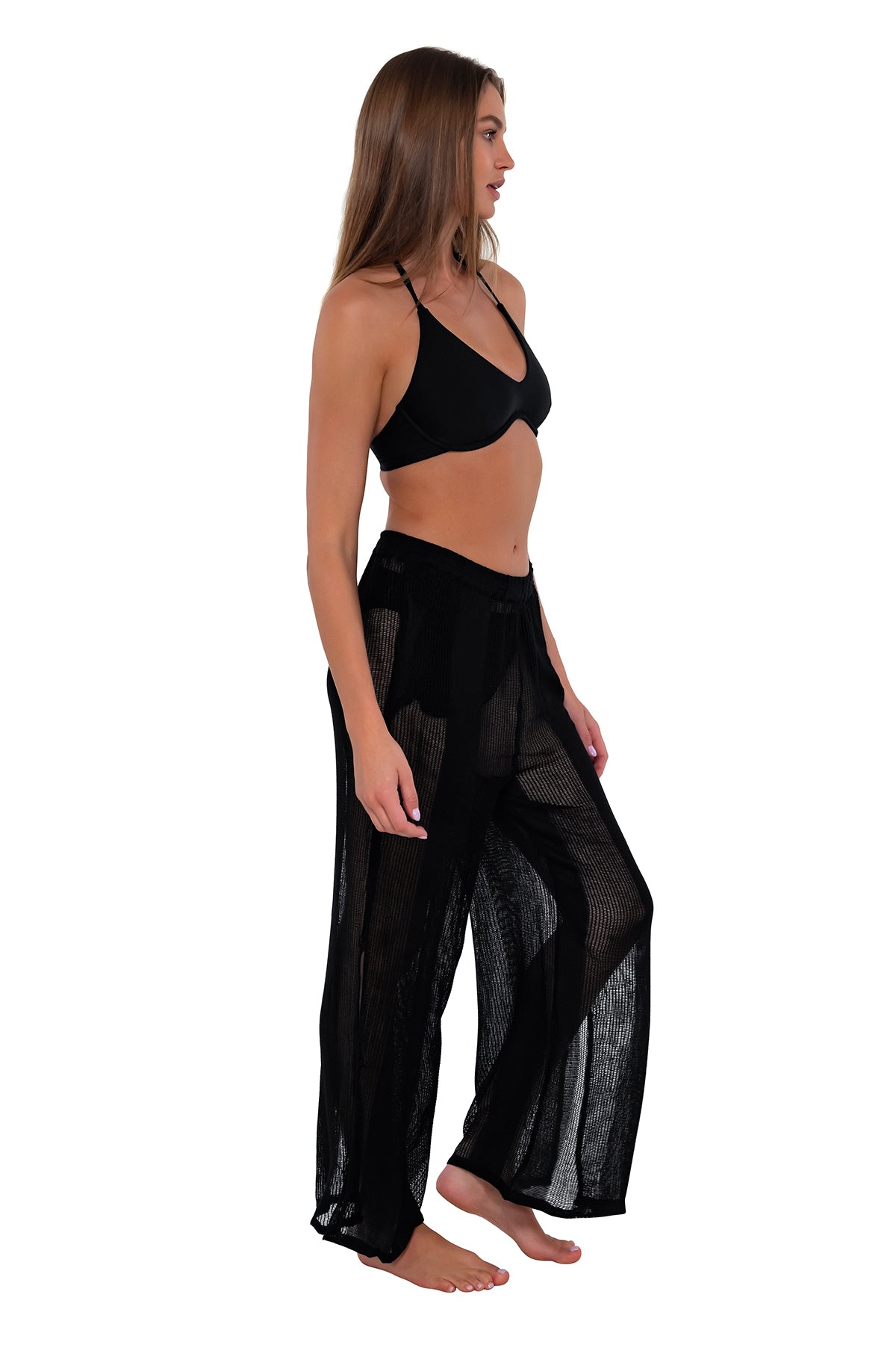 Side pose #1 of Daria wearing Sunsets Black Breezy Beach Pant with matching Brooke U-Wire bikini top