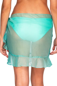 Back pose #2 of Daria wearing Sunsets Mint Short and Sweet Skirt