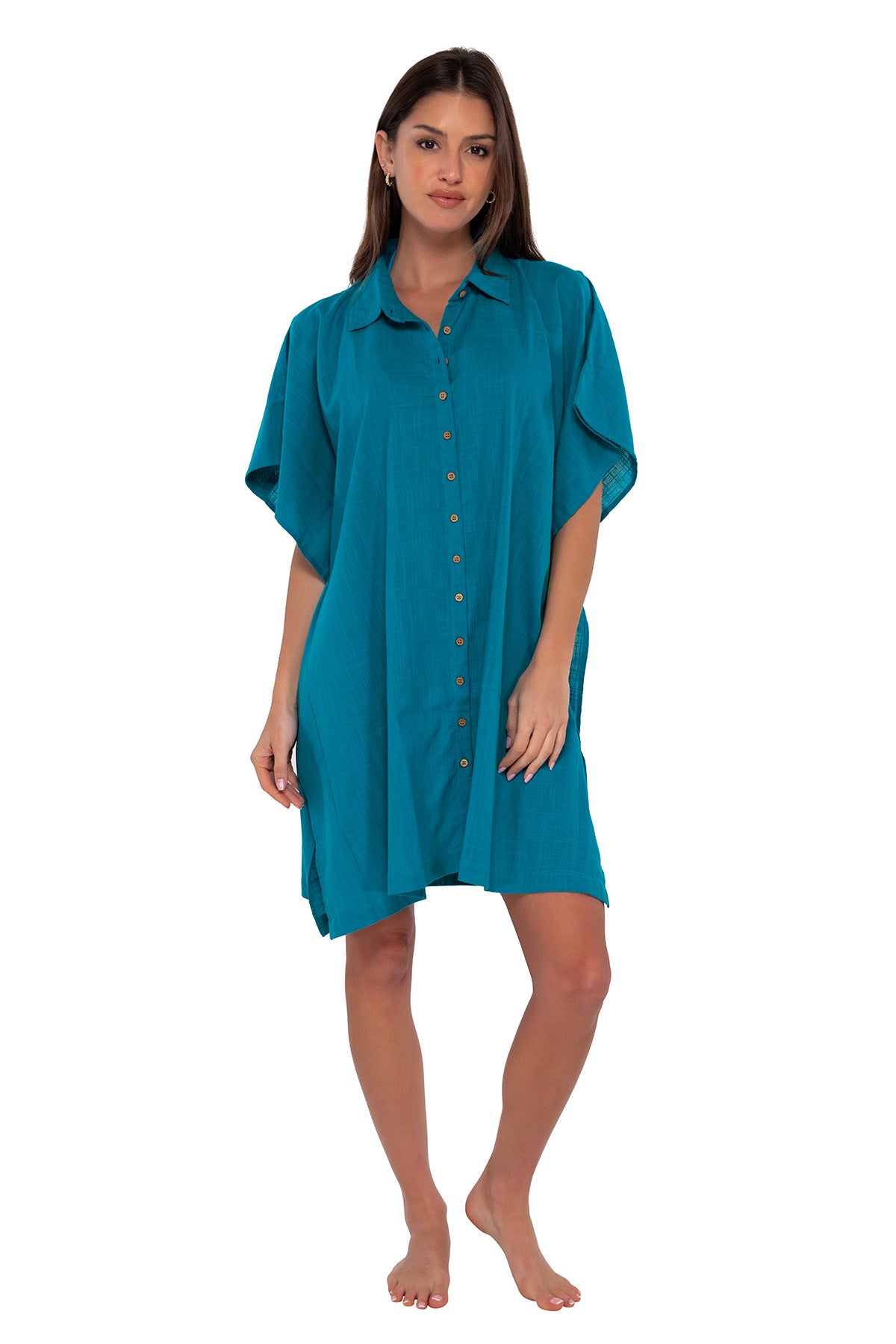 Front pose #1 of Gigi wearing Sunsets Avalon Teal Shore Thing Tunic