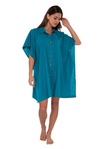 Front pose #2 of Gigi wearing Sunsets Avalon Teal Shore Thing Tunic