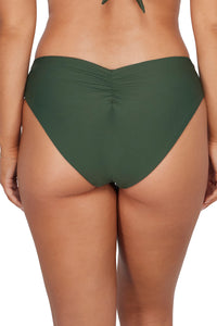 Back pose #2 of Taylor wearing Sunsets Island Green Alana Reversible Hipster Bottom