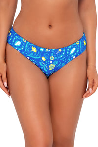 Front pose #1 of Taylor wearing Sunsets Pineapple Grove Alana Reversible Hipster Bottom