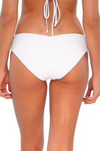 Back pose #1 of Daria wearing Sunsets White Lily Alana Reversible Hipster Bottom