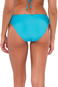 Back pose #1 of Daria wearing Sunsets Blue Bliss Audra Hipster Bottom