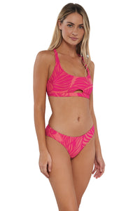 Quarter pose #2 of Jessica wearing Sunsets Blushing Palms Sandbar Rib Collins Hipster Bottom paired with matching