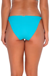 Back pose #1 of Taylor wearing Sunsets Blue Bliss Everlee Tie Side Bottom