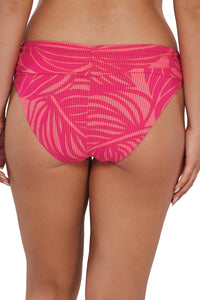 Back pose #2 of Taylor wearing Sunsets Blushing Palms Sandbar Rib Unforgettable Bottom