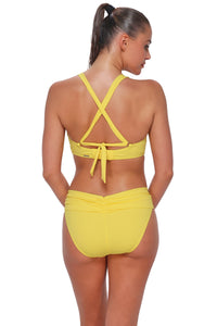 pose #1 of Daniella wearing Sunsets Pineapple Crepe Unforgettable Bottom