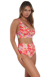 Quarter pose #1 of Taylor wearing Sunsets Butterfly Beach Capri High Waist Bottom paired with matching Elsie Bikini Top