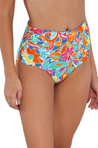 Quarter pose #1 of Jessica wearing Sunsets Festive Floral Sandbar Rib Capri High Waist Bottom