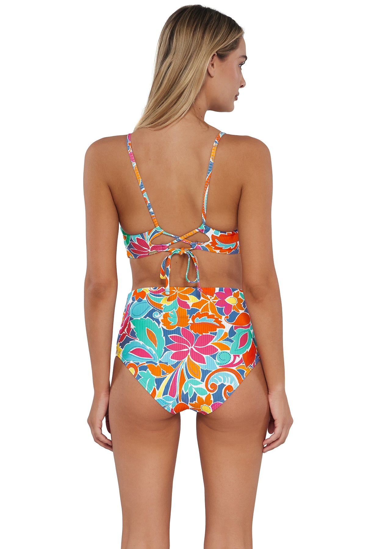 Back pose #1 of Jessica wearing Sunsets Festive Floral Sandbar Rib Capri High Waist Bottom paired with matching