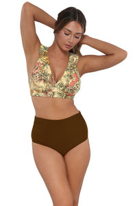 Active pose #1 of Taylor wearing Sunsets Island Spice Capri High Waist Bottom paired with matching