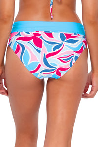 Back pose #1 of Daria wearing Sunsets Making Waves Capri High Waist Bottom showing folded waist