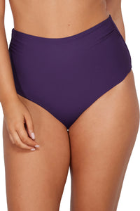 Front pose #2 of Taylor wearing Sunsets Paradise Plum Capri High Waist Bottom