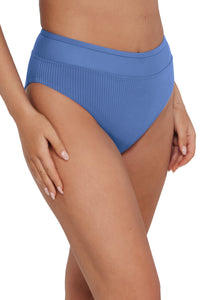 Quarter pose #1 of Taylor wearing Sunsets Harbor Blue Sandbar Rib Annie High Waist Bottom