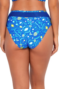 Back pose #1 of Taylor wearing Sunsets Pineapple Grove Annie High Waist Bottom .