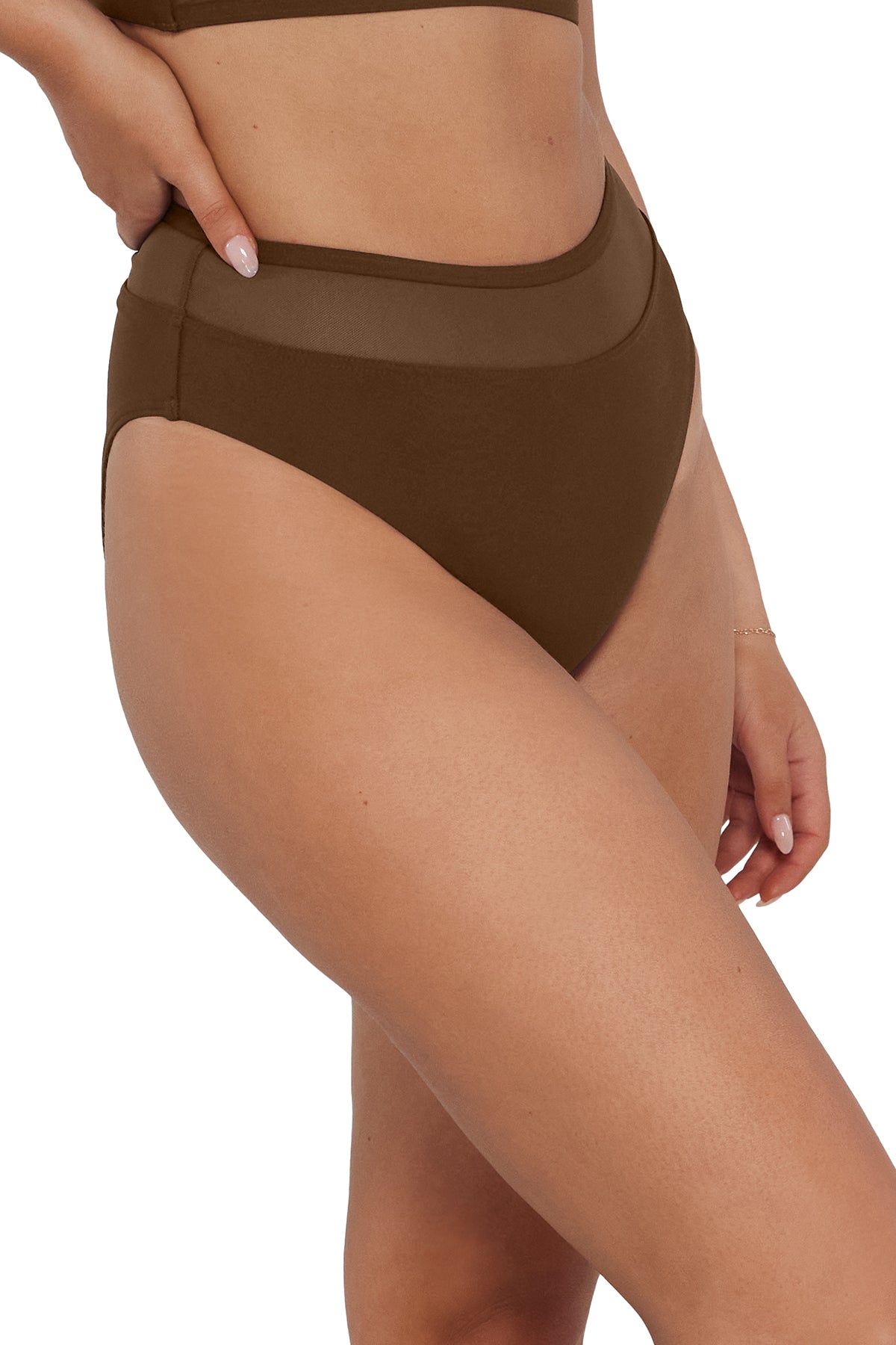 pose #1 of Taylor wearing Sunsets Tiki Brown Annie High Waist Bottom