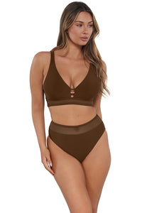 Active pose #2 of Taylor wearing Sunsets Tiki Brown Annie High Waist Bottom paired with matching