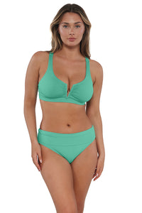 Front pose #1 of Taylor wearing Sunsets Aqua Mist Sandbar Rib Hannah High Waist Bottom showing folded waist paired with matching