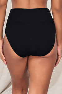 Back pose #1 of Jasmine wearing Pacifica Black Hannah High Waist Bottom