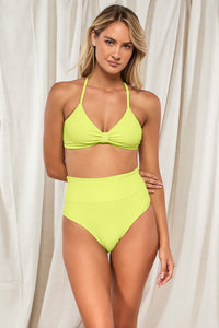 Front pose #1 of Jessica wearing Pacifica Bright Pear Hannah High Waist Bottom paired with matching