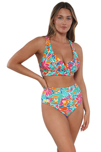 Active pose #1 of Taylor wearing Sunsets Festive Floral Sandbar Rib Hannah High Waist Bottom paired with matching