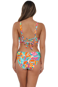 Back pose #1 of Taylor wearing Sunsets Festive Floral Sandbar Rib Hannah High Waist Bottom showing folded waist paired with matching