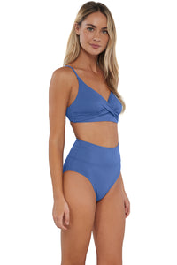 Quarter pose #1 of Jessica wearing Sunsets Harbor Blue Sandbar Rib Hannah High Waist Bottom paired with matching