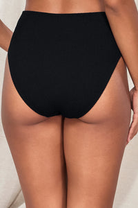 Oblique pose #2 of Jasmine wearing Pacifica Black Astrid High Waist Bottom