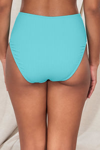 Back pose #2 of Jasmine wearing Pacifica Pool Party Astrid High Waist Bottom