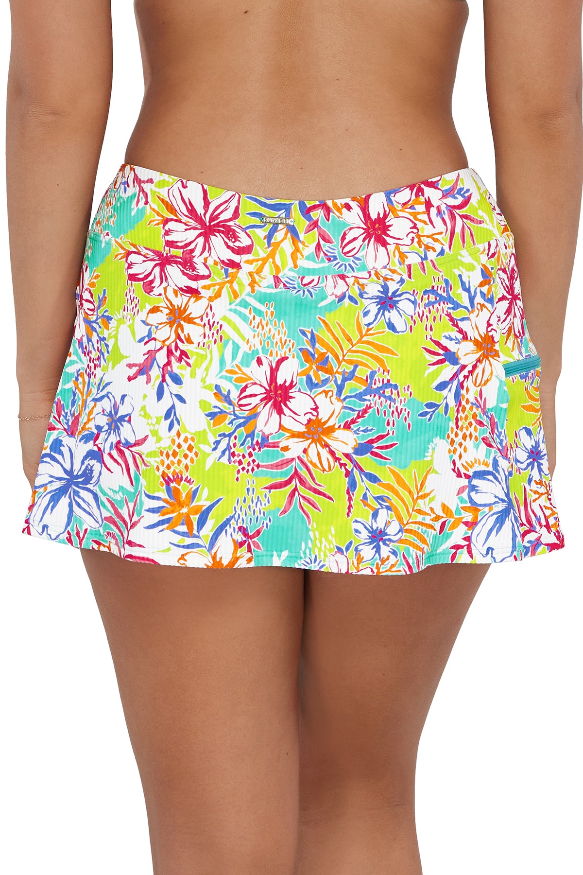 Back pose #1 of Taylor wearing Sunsets Botanical Bliss Sandbar Rib Sporty Swim Skirt