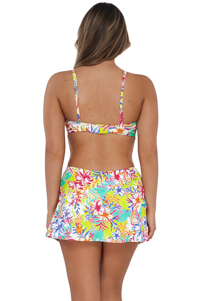 Back pose #1 of Taylor wearing Sunsets Botanical Bliss Sandbar Rib Sporty Swim Skirt paired with matching Bikini Top