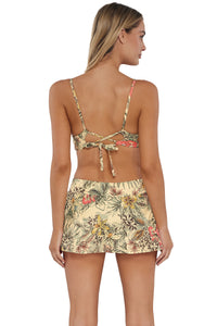 Back pose #1 of Jessica wearing Sunsets Island Spice Sporty Swim Skirt paired with matching