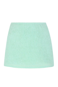Front pose #1 of a floating garment shot featuring Pacifica by Sunsets Mint Scrunch Cove Mini Skirt Cover-Up