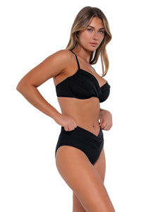 Side pose #1 of Taylor wearing Sunsets Black Summer Lovin V-Front Bottom with matching Crossroads Underwire bikini top