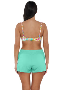 Back pose #1 of Nicki wearing Sunsets Botanical Bliss Sandbar Rib Crossroads Underwire Top